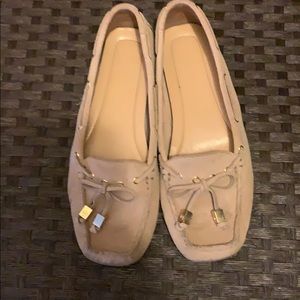 Michael Koran’s blush pink flats